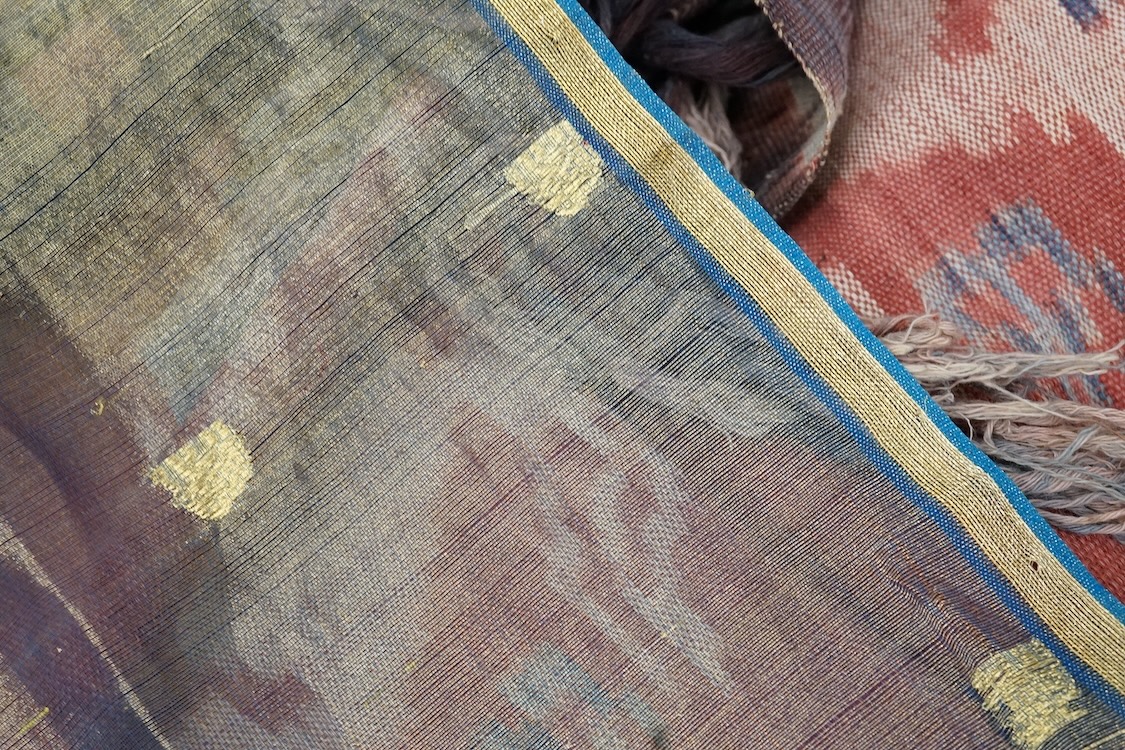 A Sumbanese shoulder cloth, an Indian chain stitch panel and a finely woven silk stole